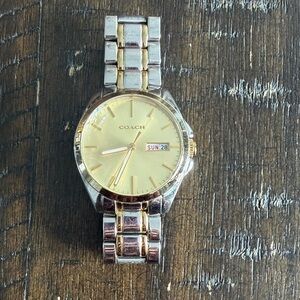 Coach Women’s Silver and Gold Watch